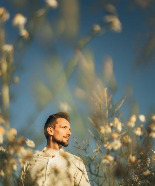 Man looking focused and energetic outdoors