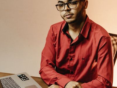 Man sitting at office desk with focus on posture